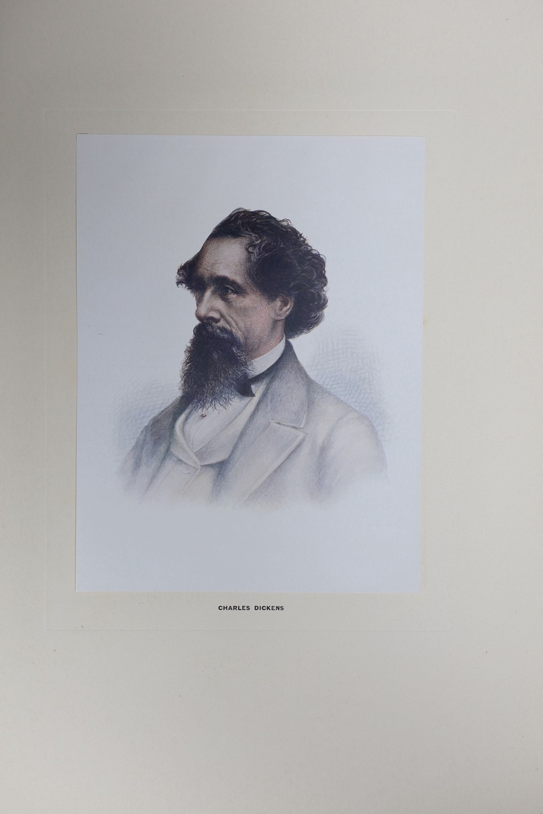 The Buchanan Portfolio of Characters from Dickens. title plate, portrait of the author and 13 other coloured plates (by Frank Reynolds) with captions, mounted on thin card and contained within a linen-backed faux leather